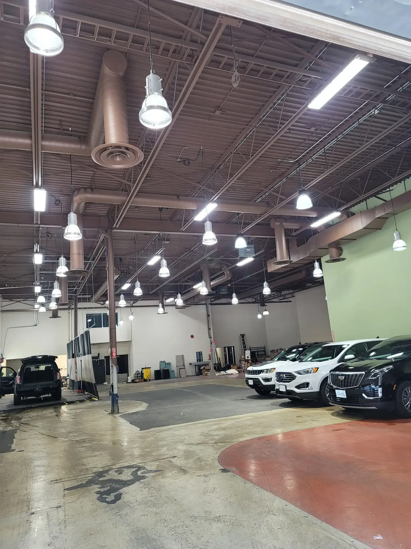 Commercial ductwork installation at auto dealership